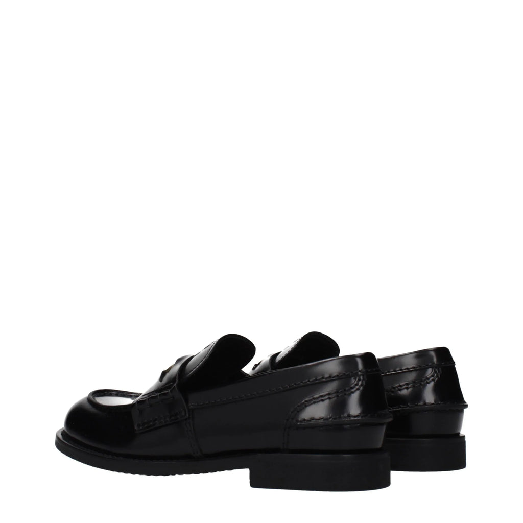 Miu Miu Black Leather Slip-On Loafers - Zeiniez