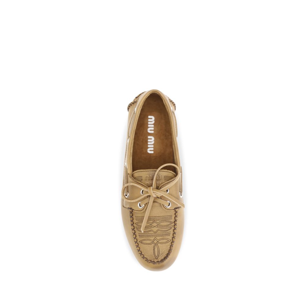 Miu Miu Beige Calf Leather Bos Taurus Slip-On Loafers