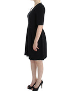 CO|TE Black short sleeve venus dress - Zeiniez