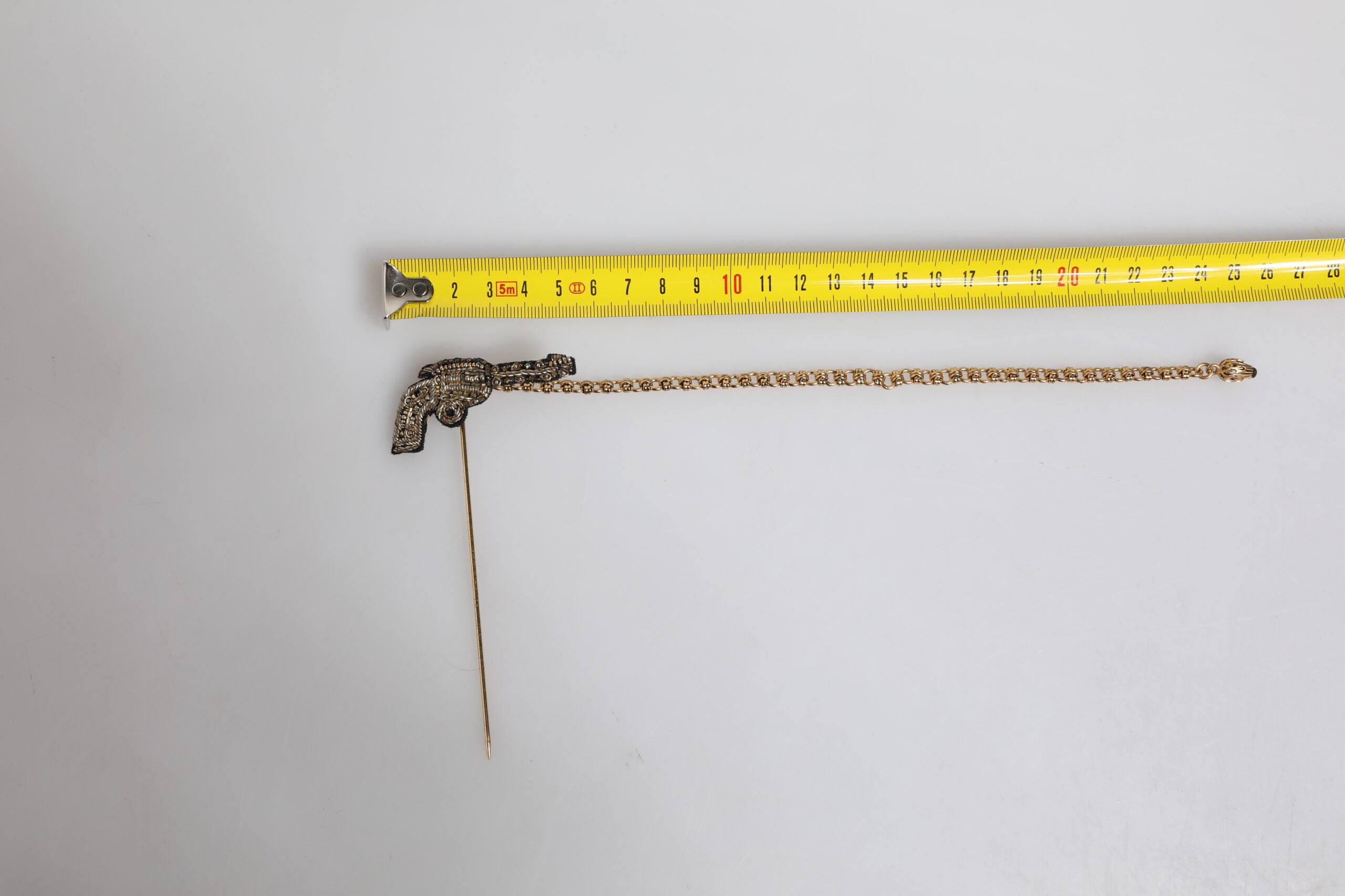 Dolce & Gabbana Black Gold Brass Copper Revolver Brooch Lapel Pin - Zeiniez