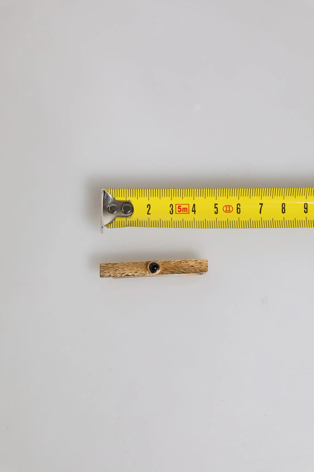 Dolce & Gabbana Black Sapphire Gold Tone Brass Tie Clip Bar - Zeiniez