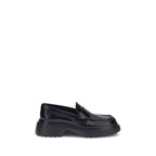 Tod's Black Rubber Platform Loafers - Zeiniez