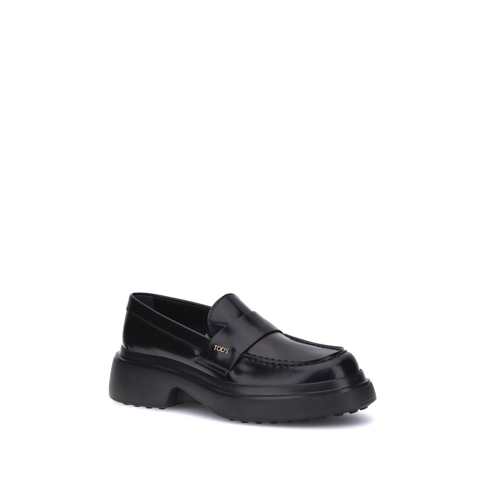 Tod's Black Rubber Platform Loafers - Zeiniez