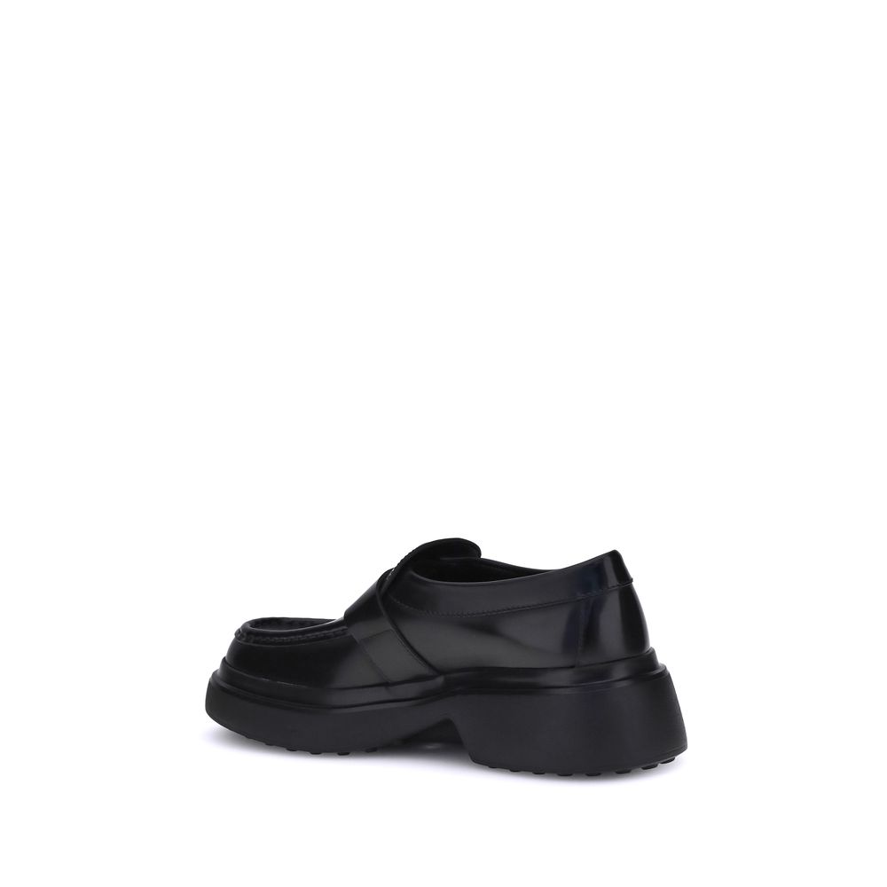 Tod's Black Rubber Platform Loafers - Zeiniez