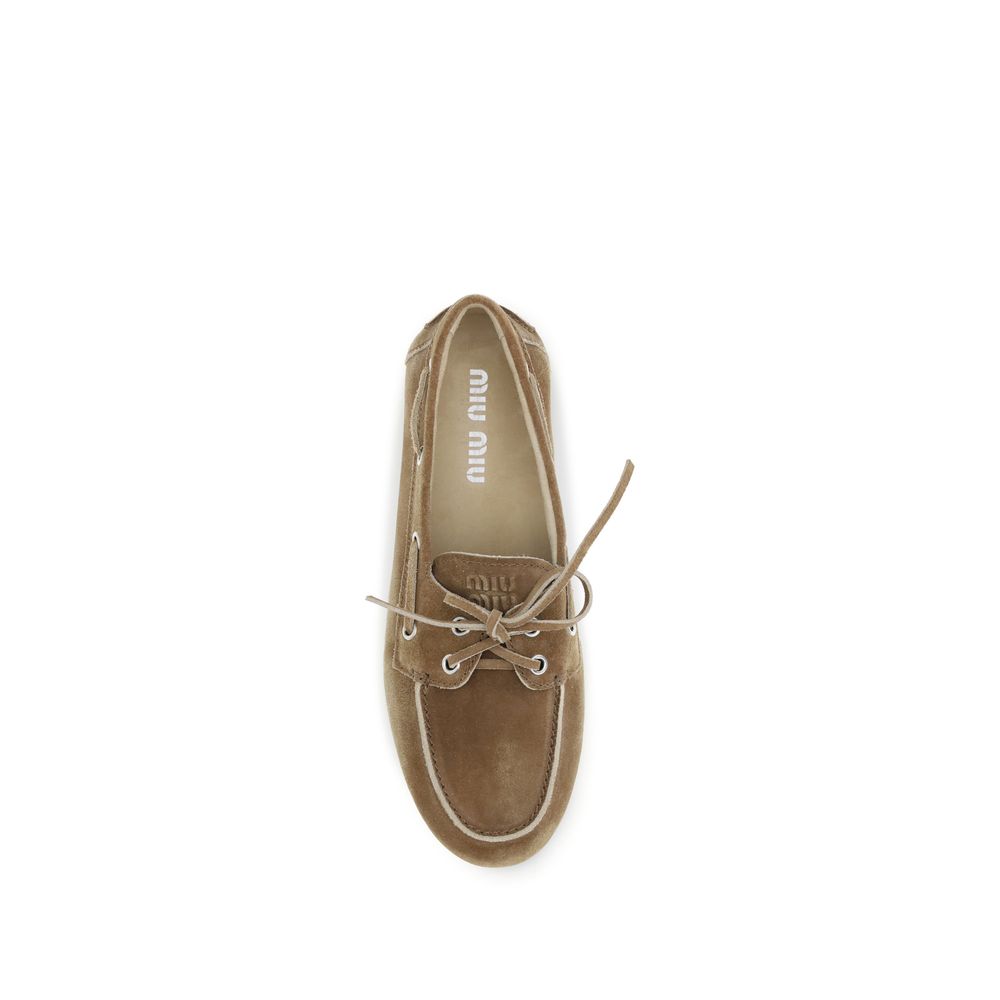 Miu Miu Beige Calf Leather Bos Taurus Slip-On Loafers - Zeiniez